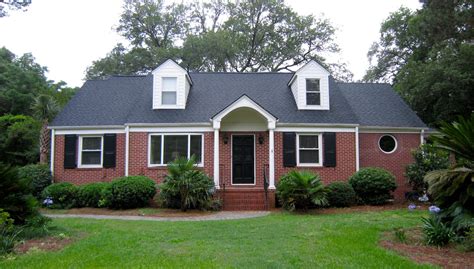 brick houses with metal roofs|brick and shingle combinations.